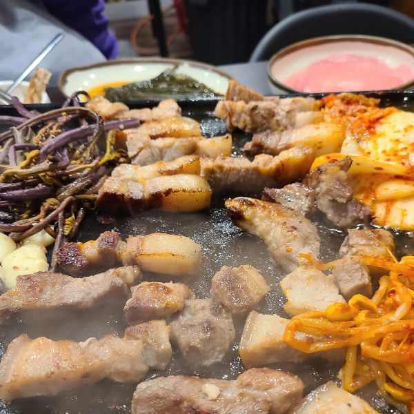 Shared meal of Korean BBQ in Korea
