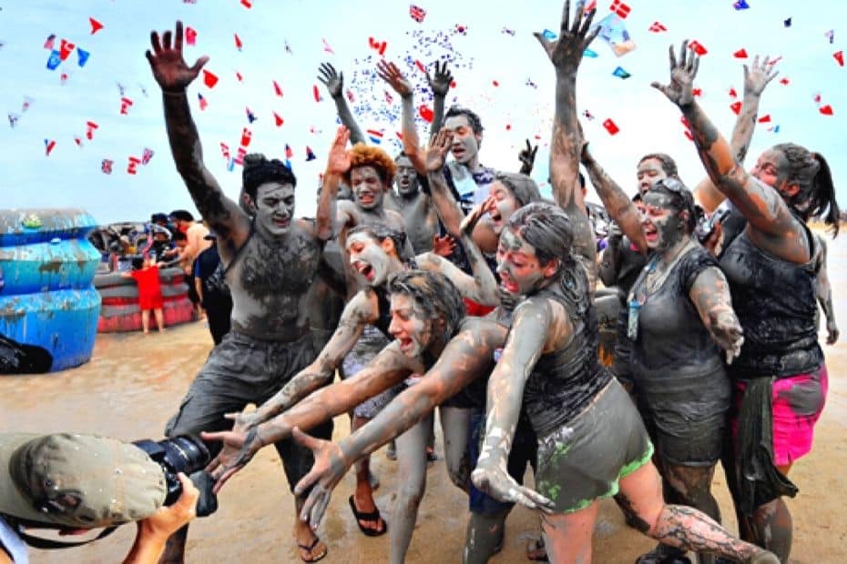 Expats enjoying the Boryeong Mud Festival, Korea