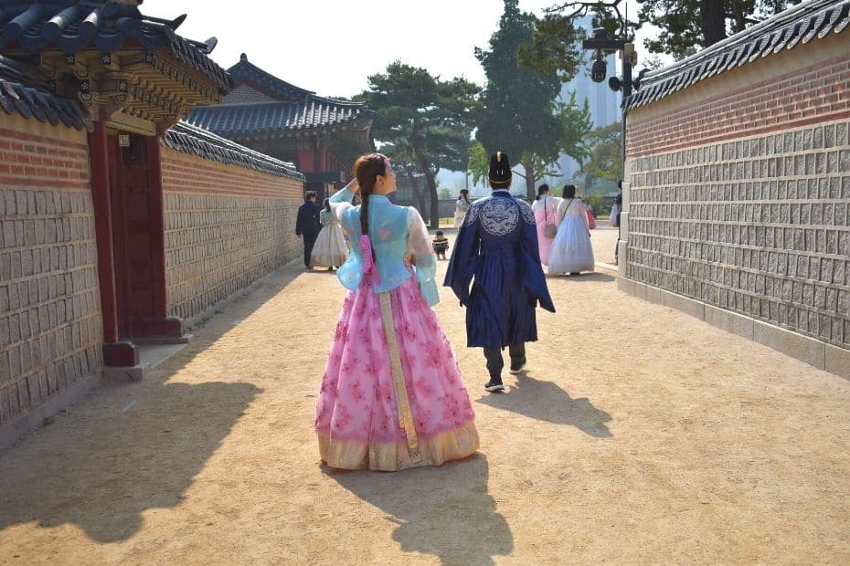 Woman wearing hanbok in Seoul, one of many unique Korean experiences for your South Korea Bucket List