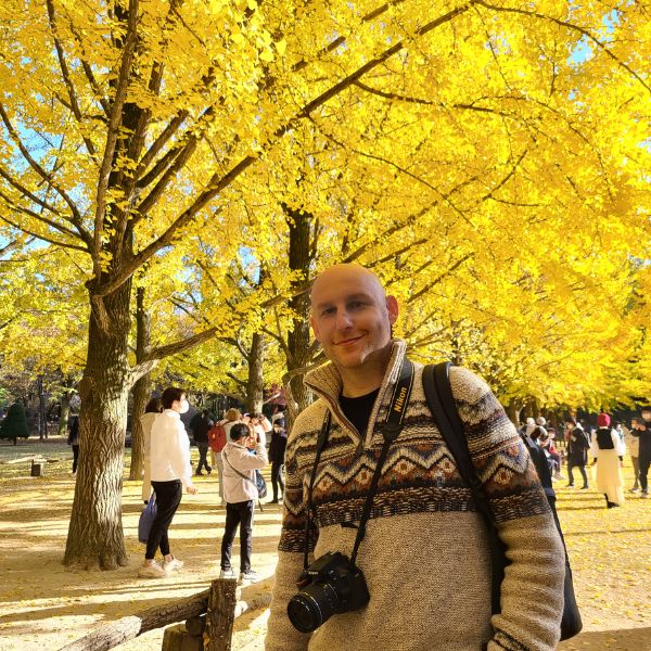 Man with Korean autumn foliage