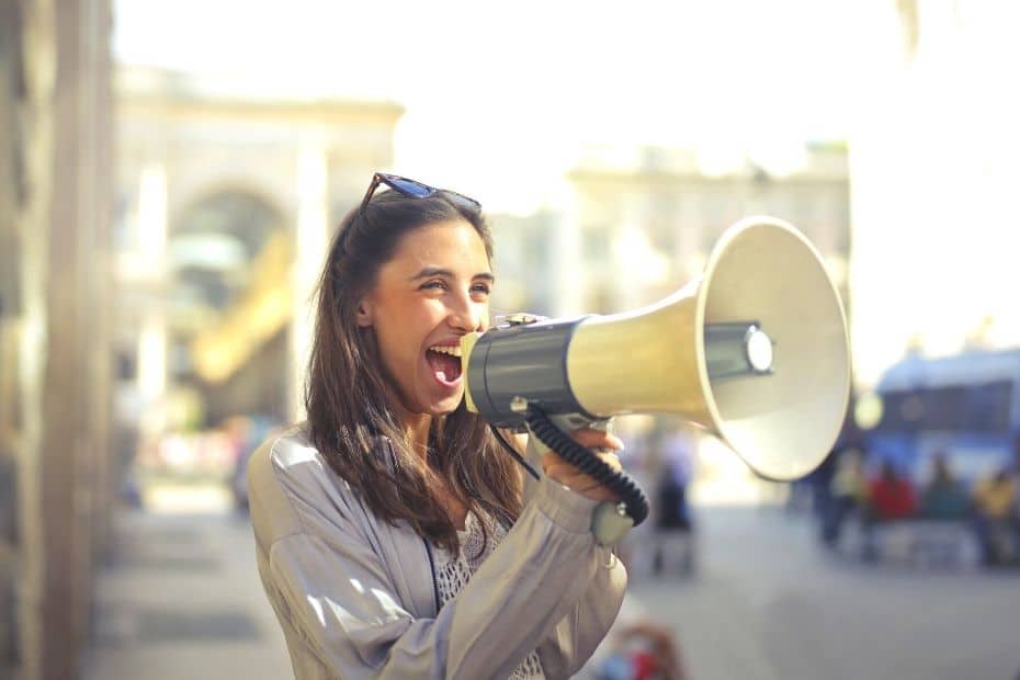 Woman speaking through a megaphone