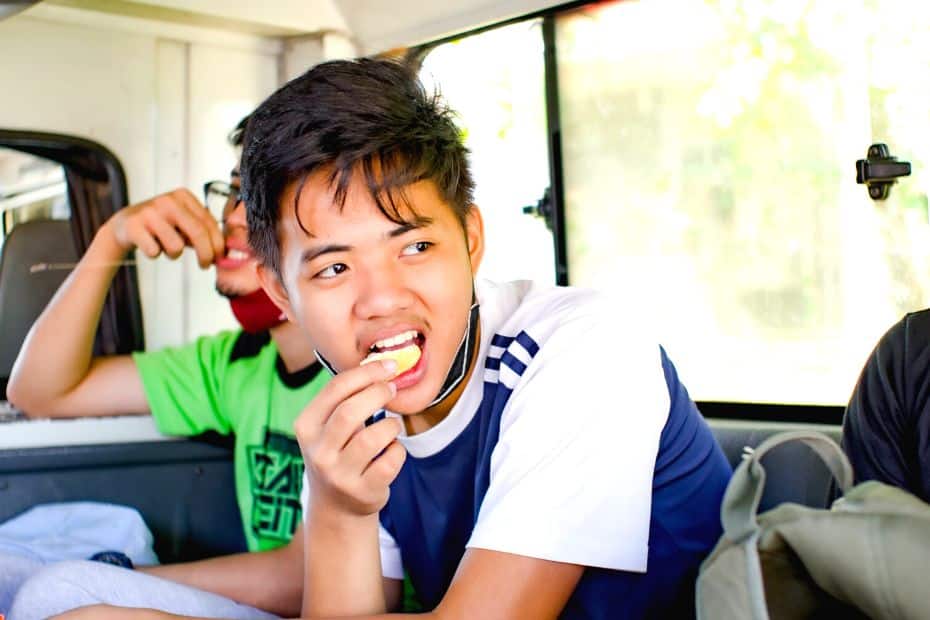 Person eating on public transport