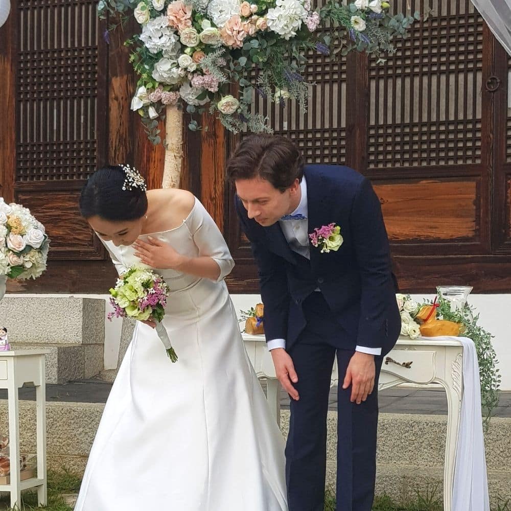 Wedding In Korea With Couple Bowing