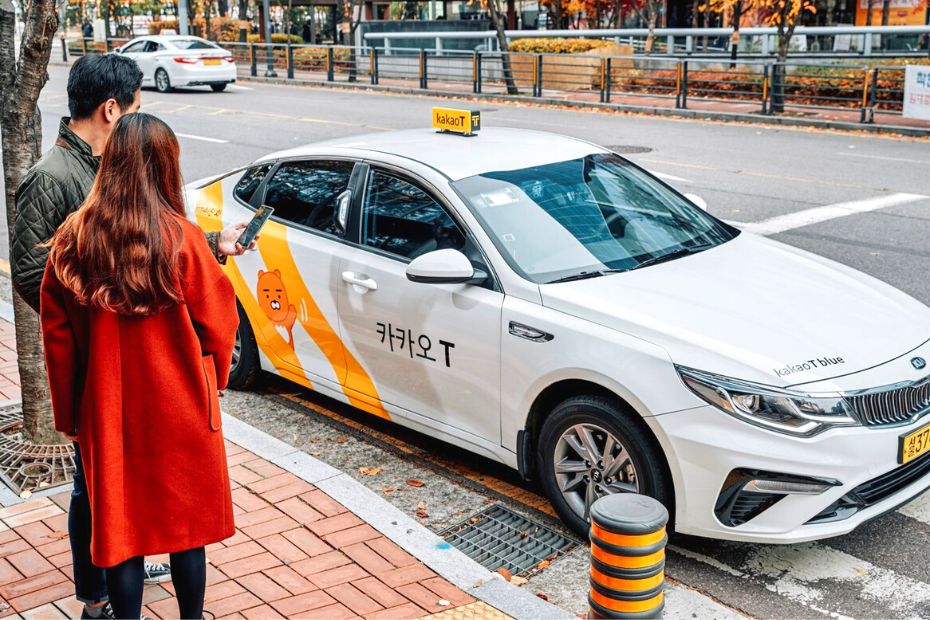 Couple using a taxi in Korea