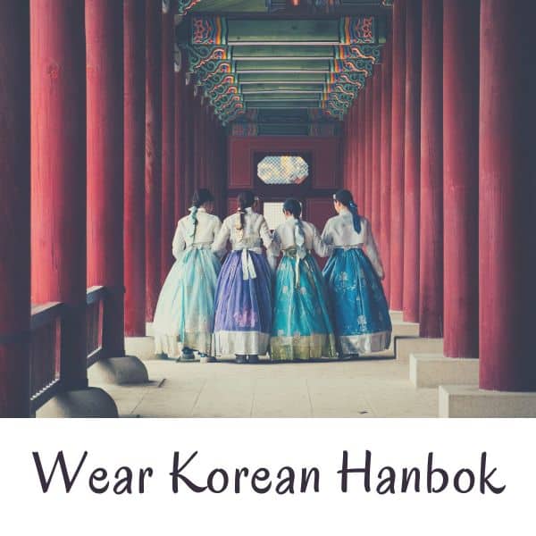 People wearing Korean traditional hanbok dresses