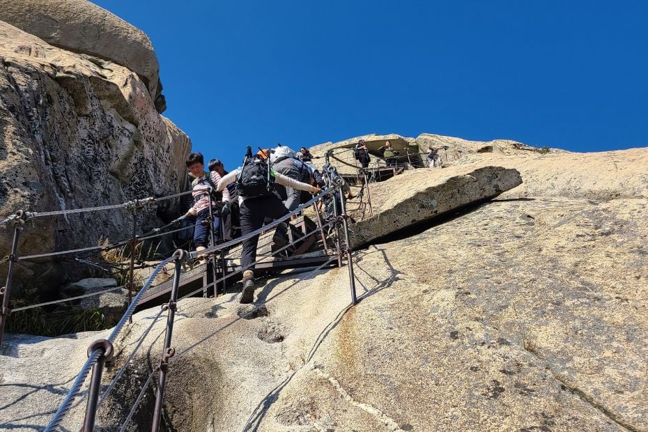 Rocky ascent to the top of Baegundae Peak
