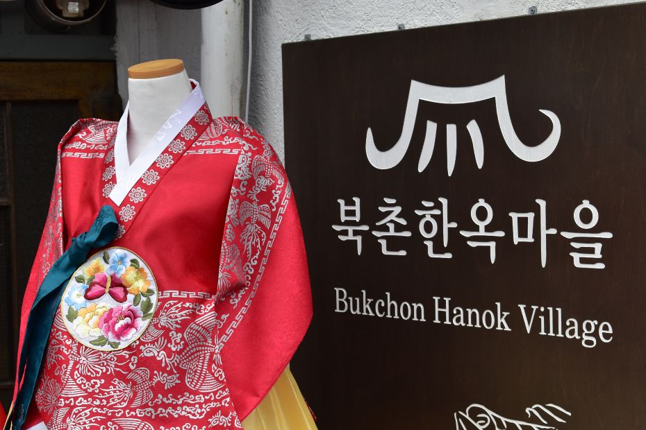 Bukchon Hanok Village Sign with Korean Hanbok