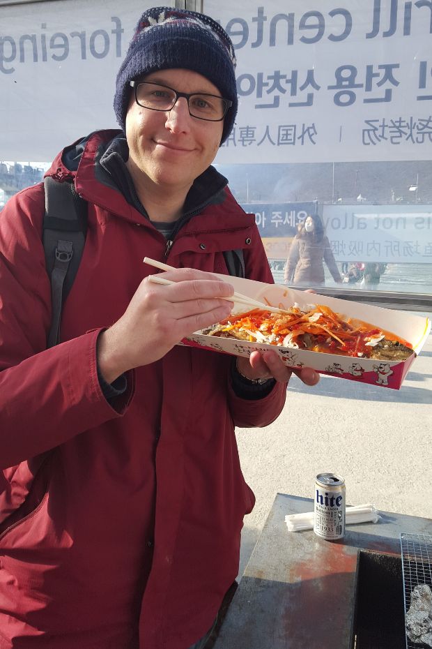Eating fish at the Hwacheon Ice Fishing Festival in Korea