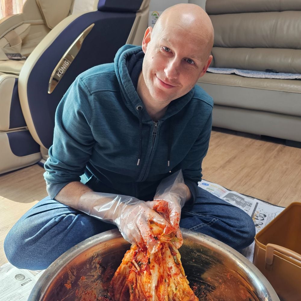 Man making kimchi on kimchi making day