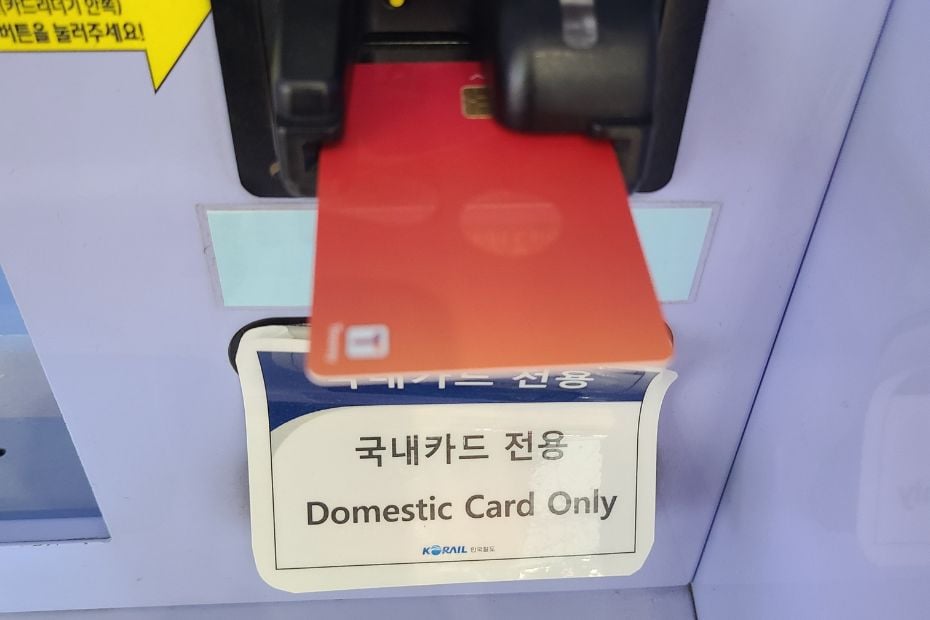 Sign showing payment restrictions at Korean station