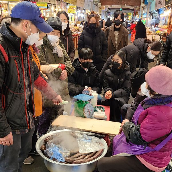 Woman selling sundae in Korean Traditional Market