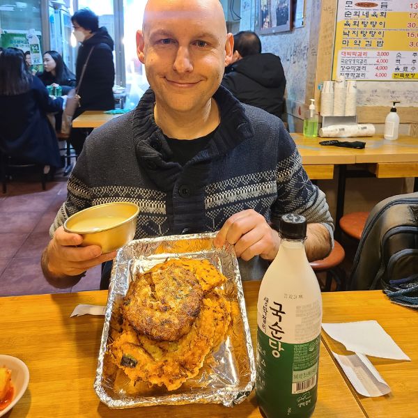 Eating bindaetteok in Gwangjang Market